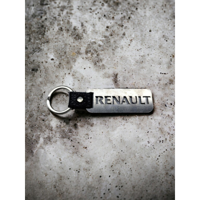 Брелок з металу та назвою марки Renault