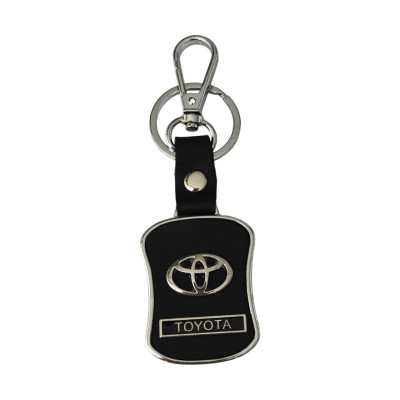 Брелок з логотипом авто Toyota, карабін та кільце, металевий зі вставками натуральної шкіри.